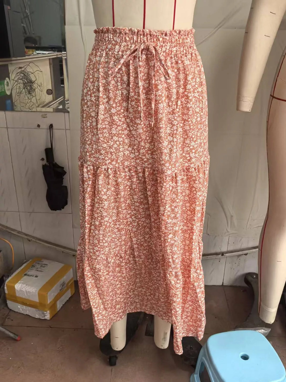 Pink floral drawstring tiered skirt — front view