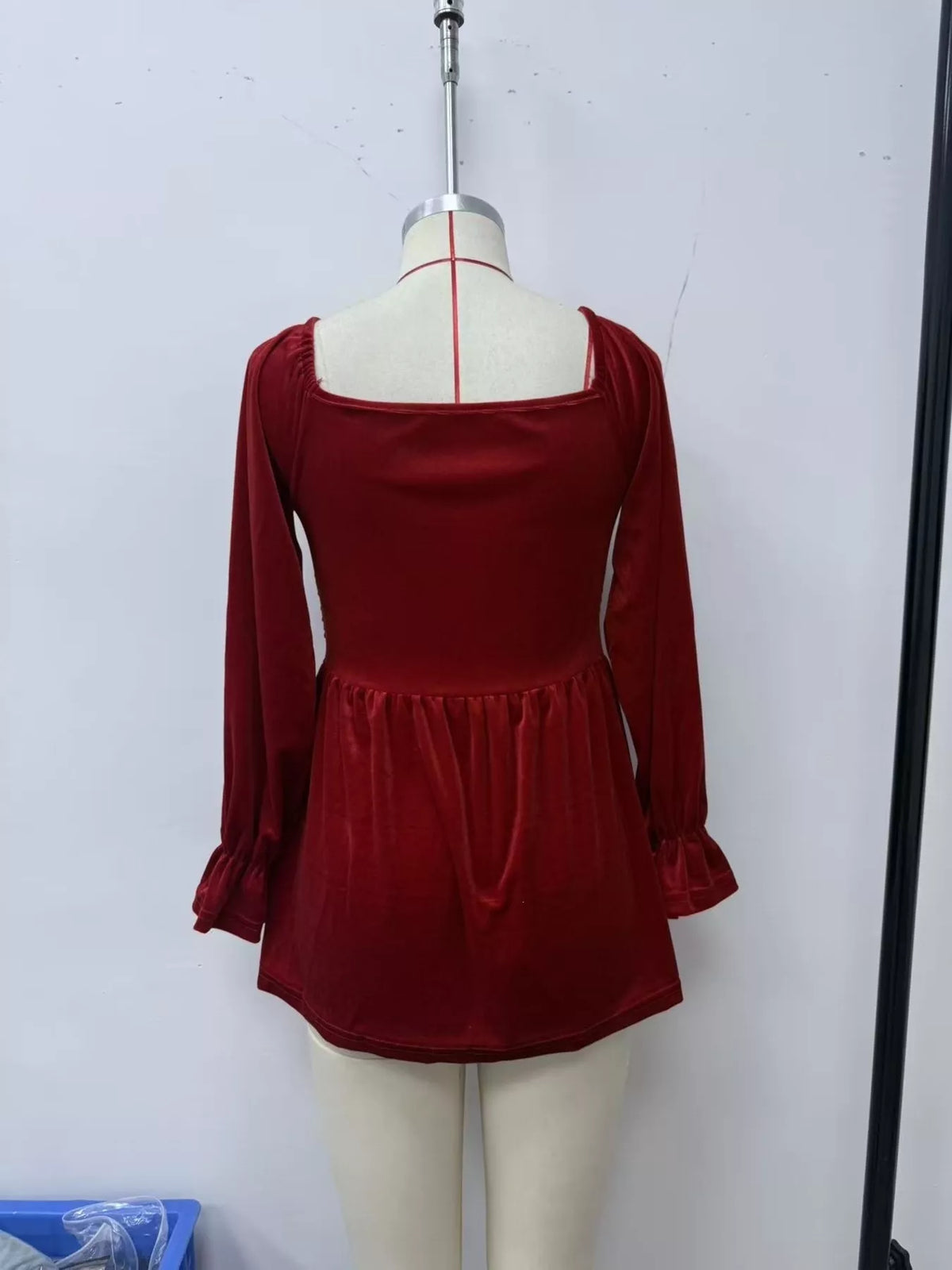 Women's Velvet Smocked Peplum Blouse in Burgundy, back view