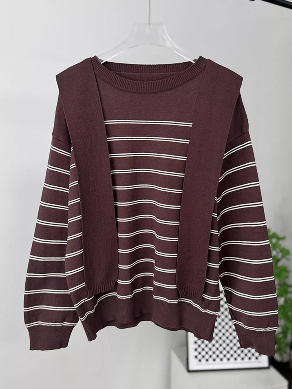 Striped crewneck sweater with layered tie detail in brown, hanging front view