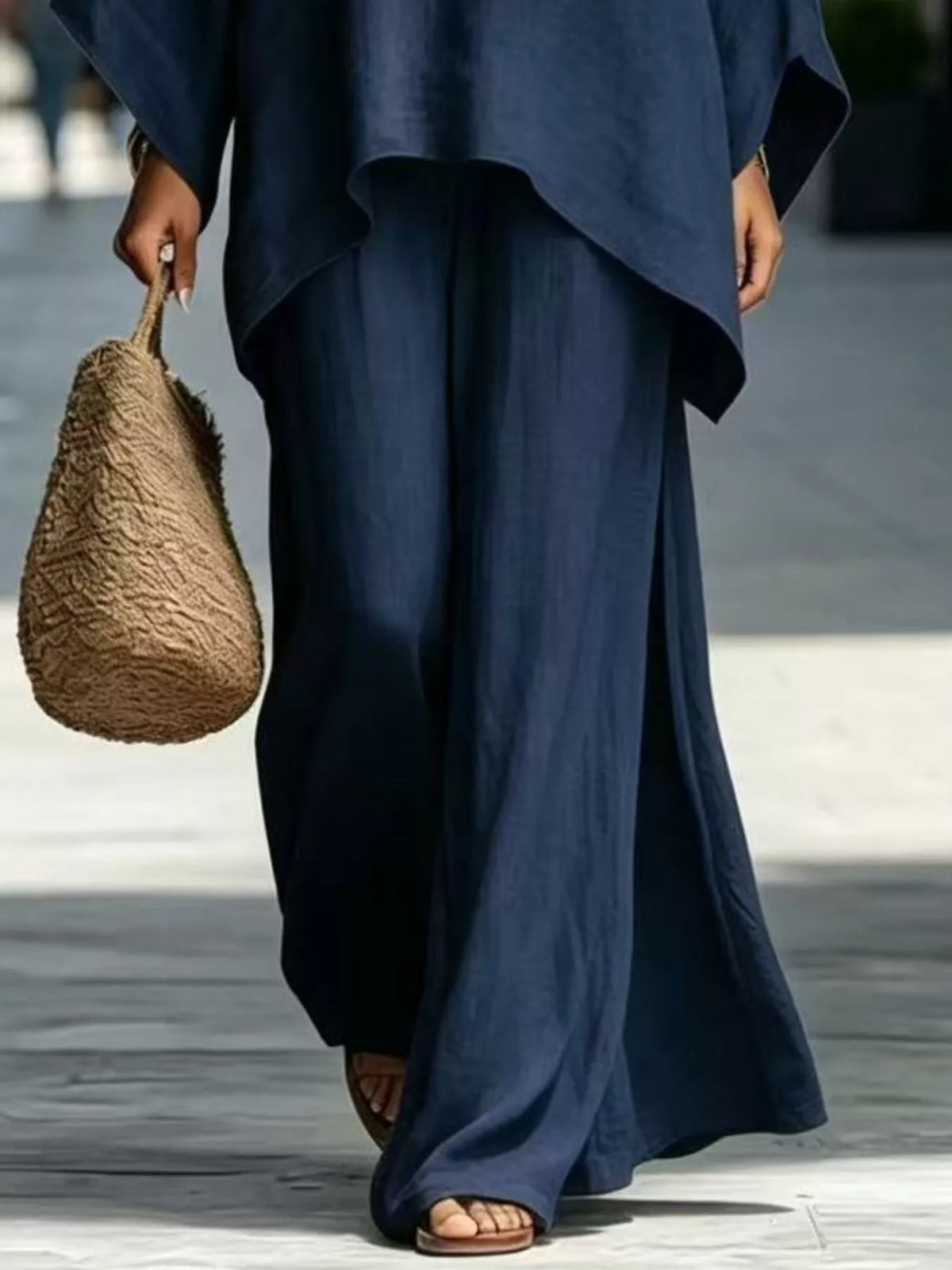 Navy blue matching wide-leg pants and top hem detail