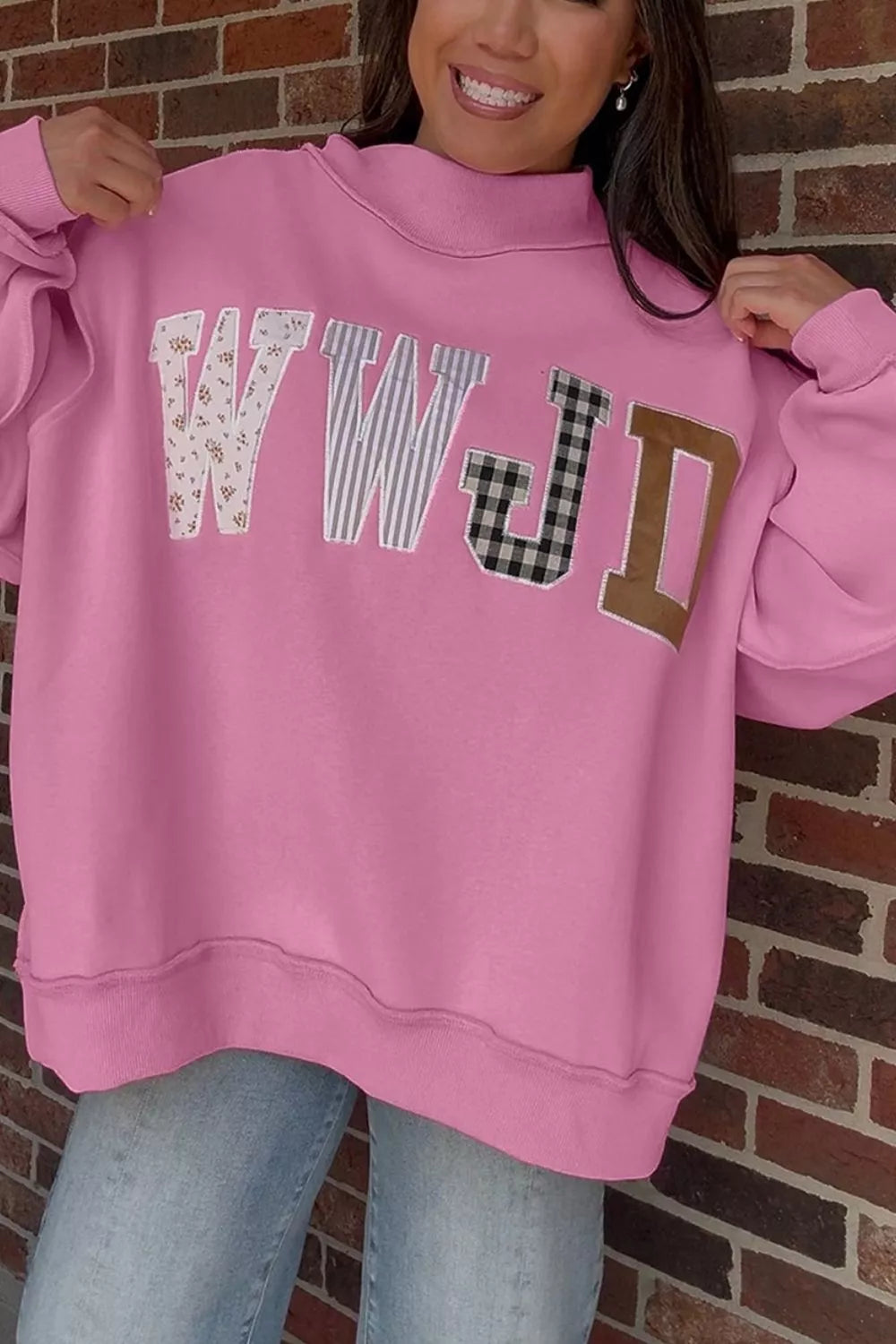 WWJD Embroidered Patch Mock Neck Sweatshirt — front view