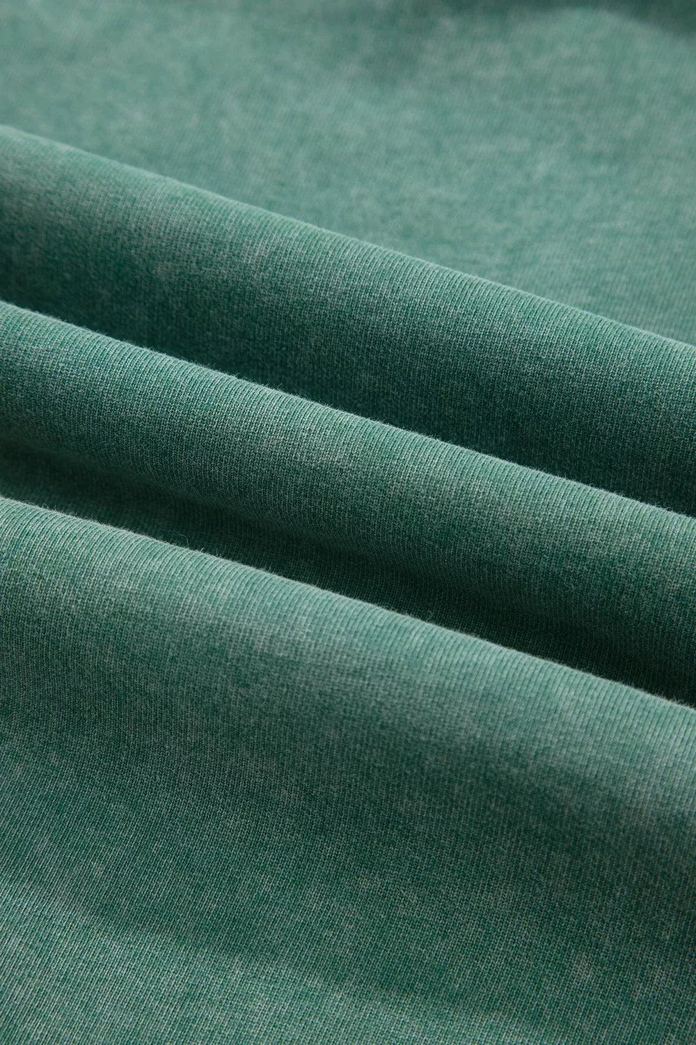 Plaid Kangaroo Pocket Hoodie in green, texture detail