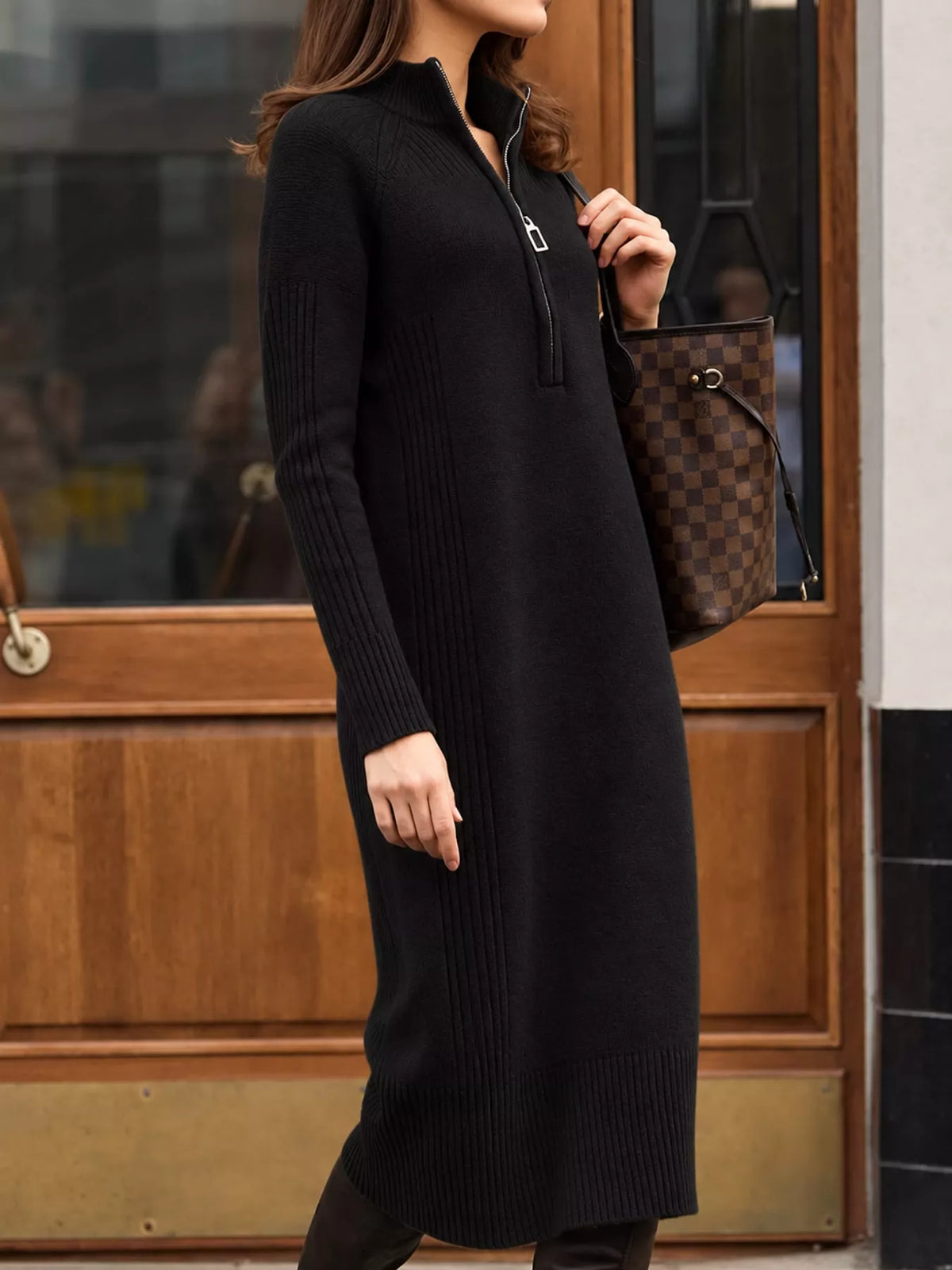 Black half-zip ribbed knit sweater dress — front view