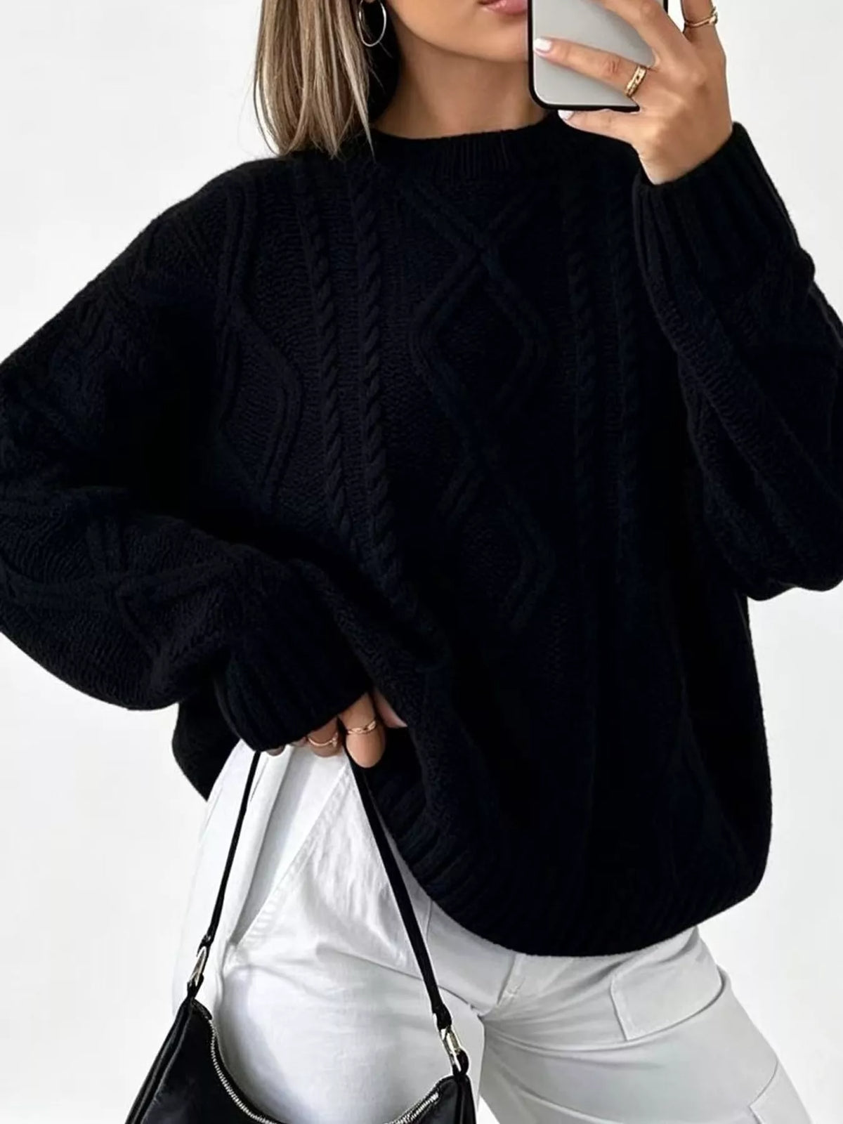 Black cable-knit round neck sweater