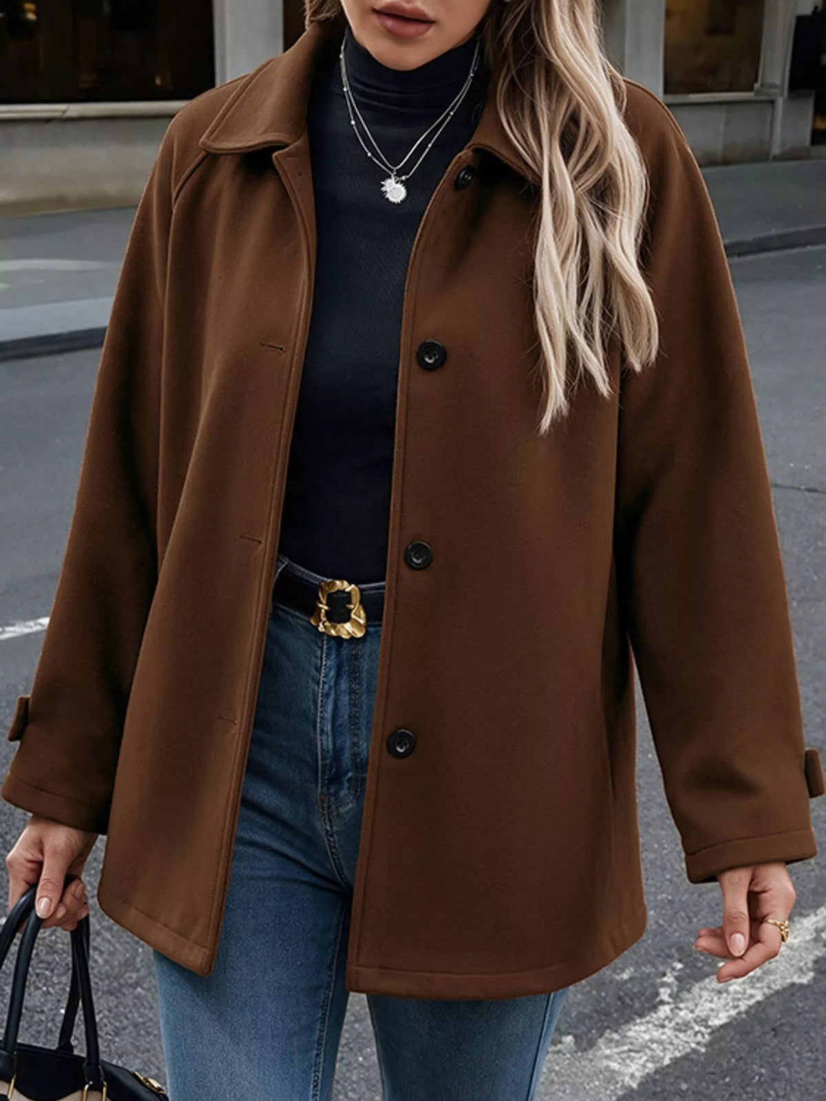 Brown button-up raglan sleeve coat — front view