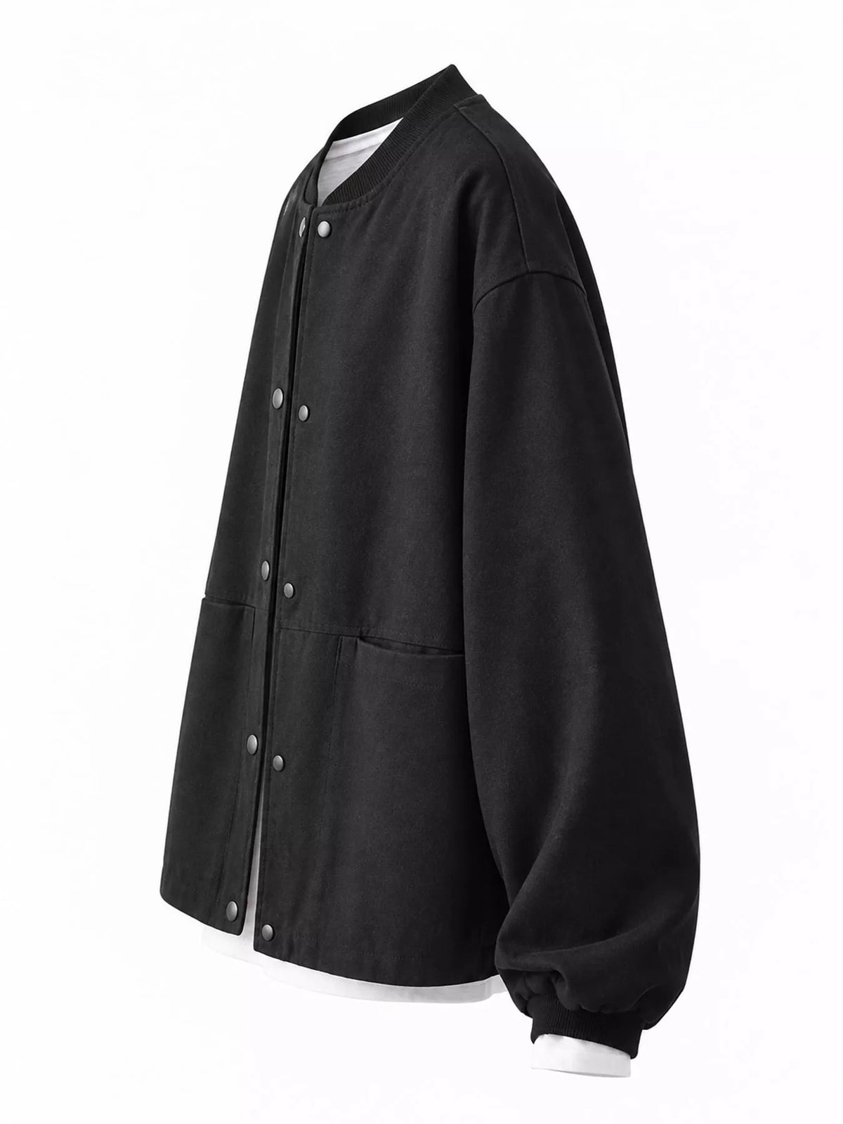 Black snap front dropped shoulder jacket, side view