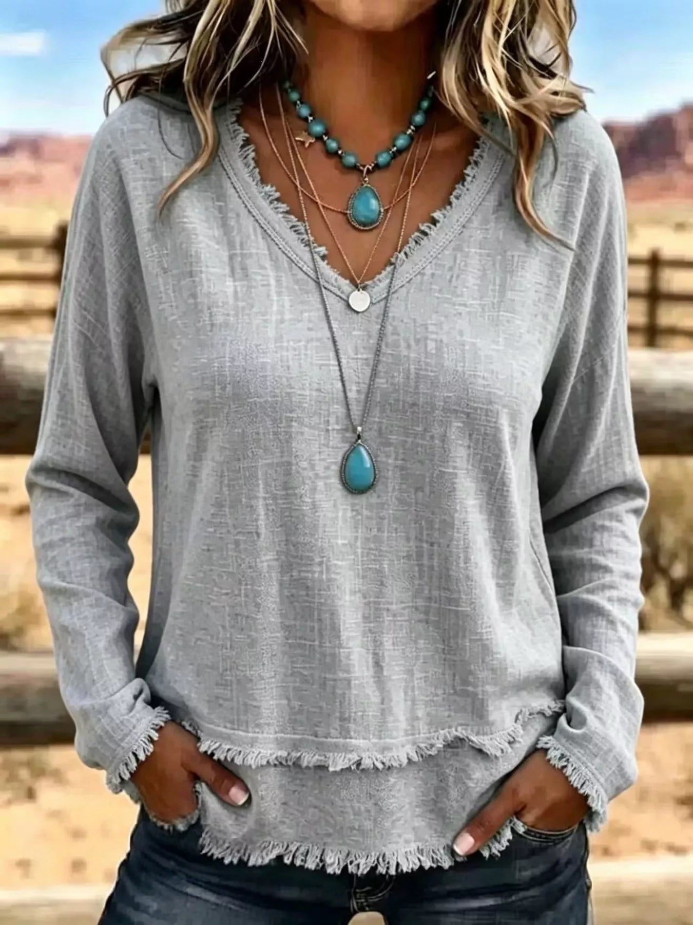 Trendsi V-Neck Long Sleeve Blouse with Frayed Hem Detail -
