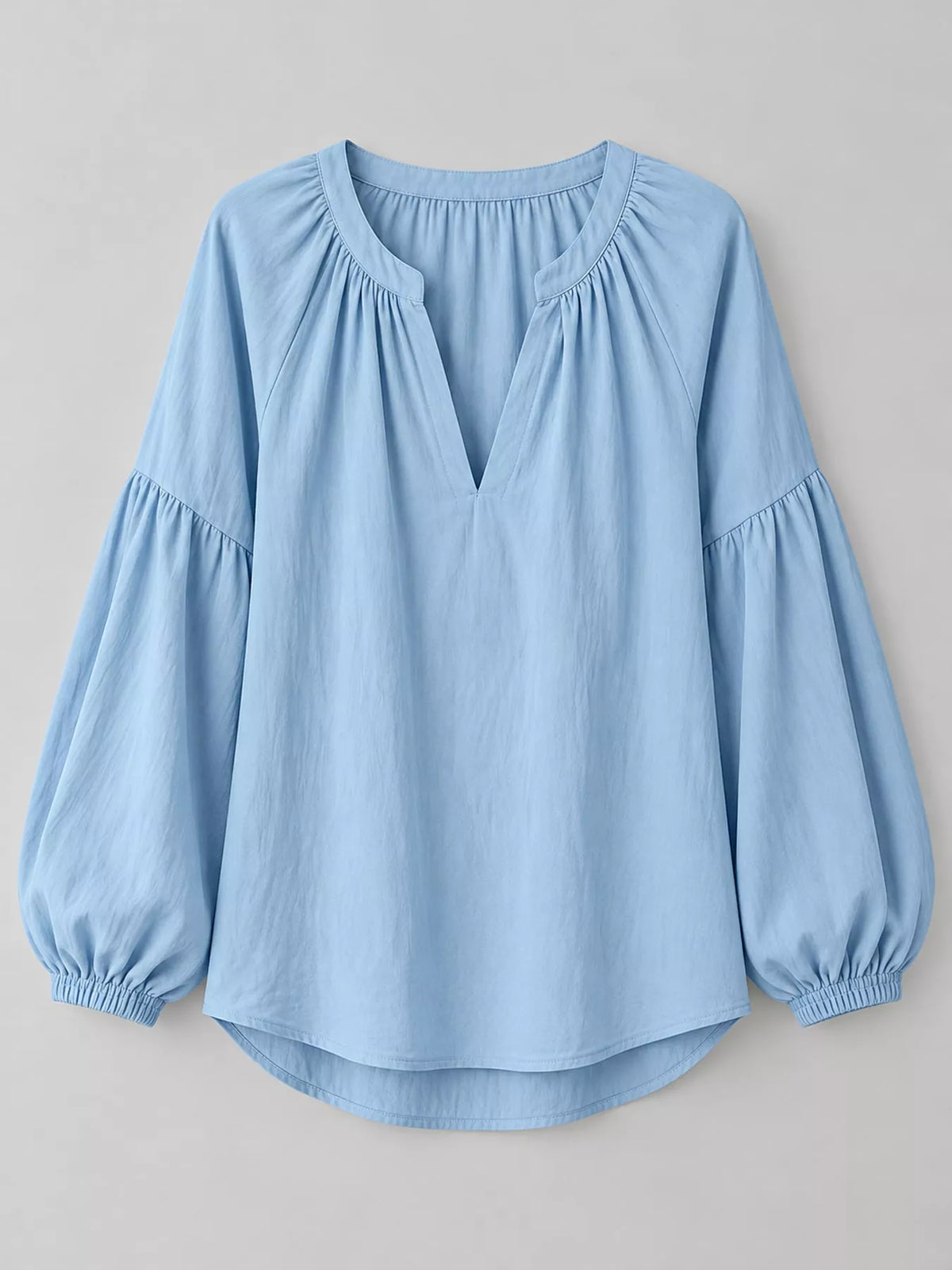 Notched Balloon Sleeve Blouse in light blue, front view