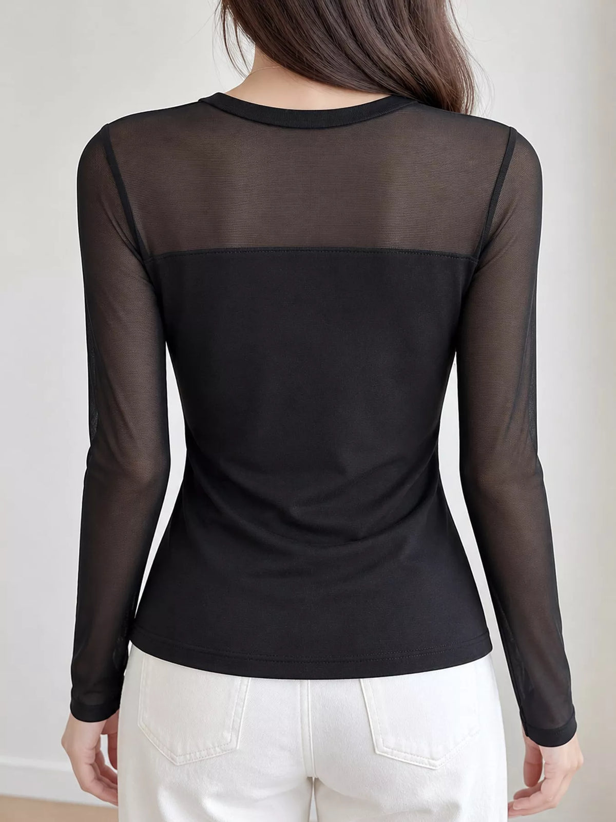 Black sheer mesh patchwork long sleeve t-shirt, back view