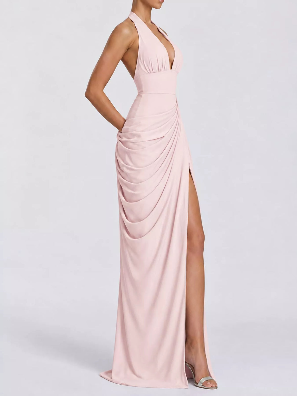 Pink halter neck high-slit maxi evening dress — side view
