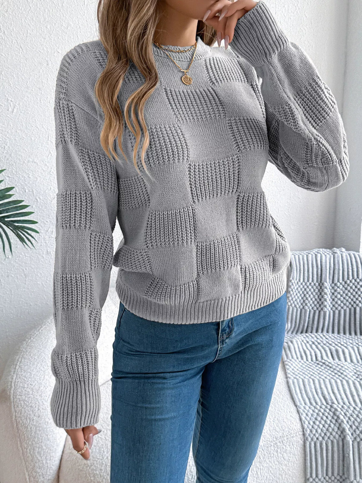 Gray checkerboard textured knit sweater