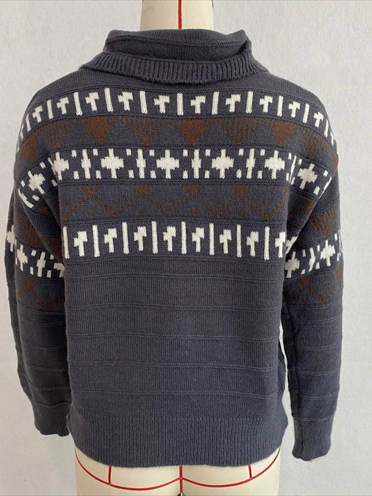 Charcoal fair isle polo-collar sweater, back on dress form.