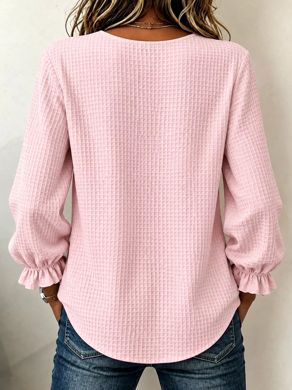 Women's Waffle Knit Flounce Sleeve Blouse in pink — back view