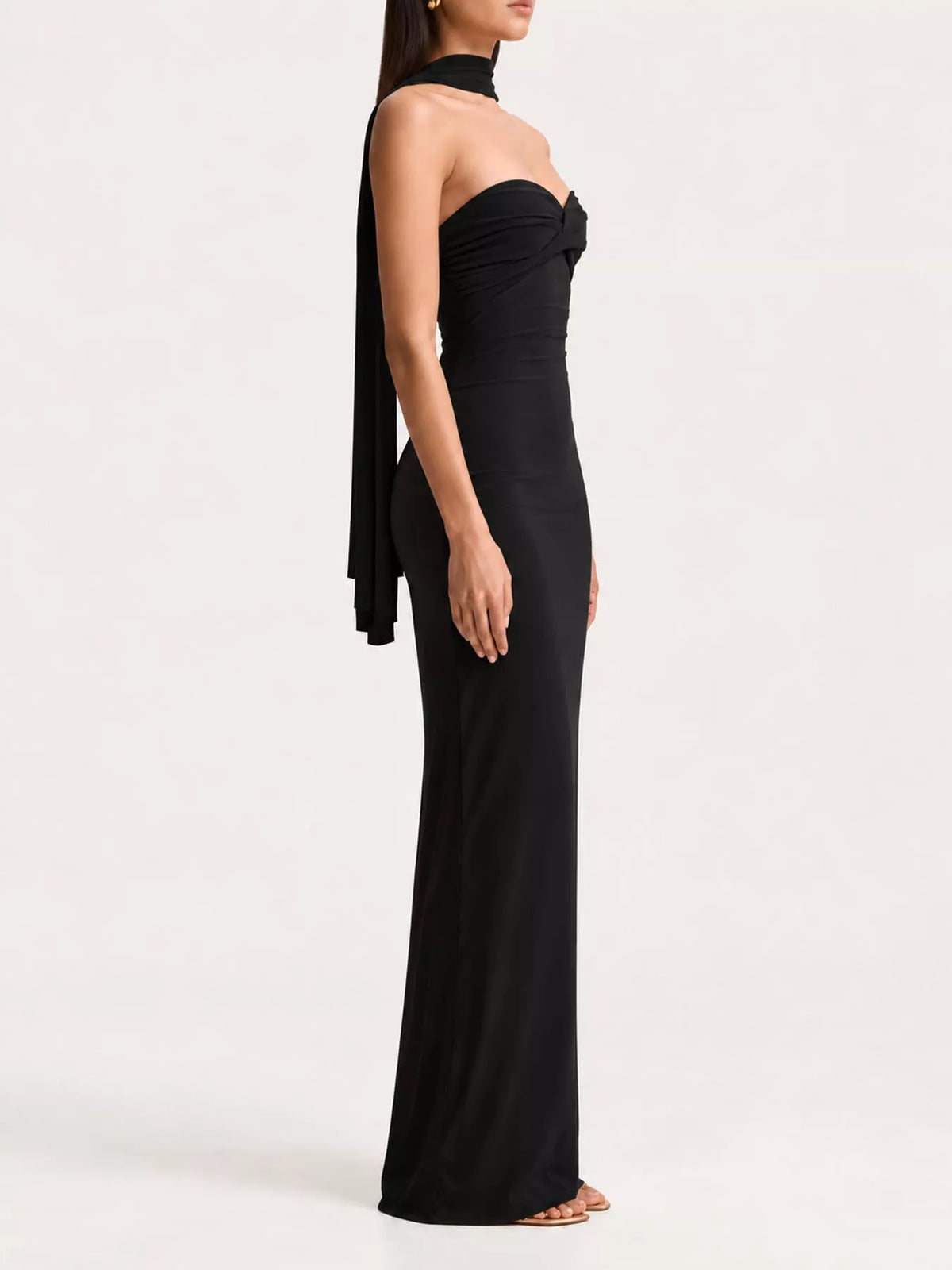 Black strapless ruched bodycon maxi dress with scarf, side view