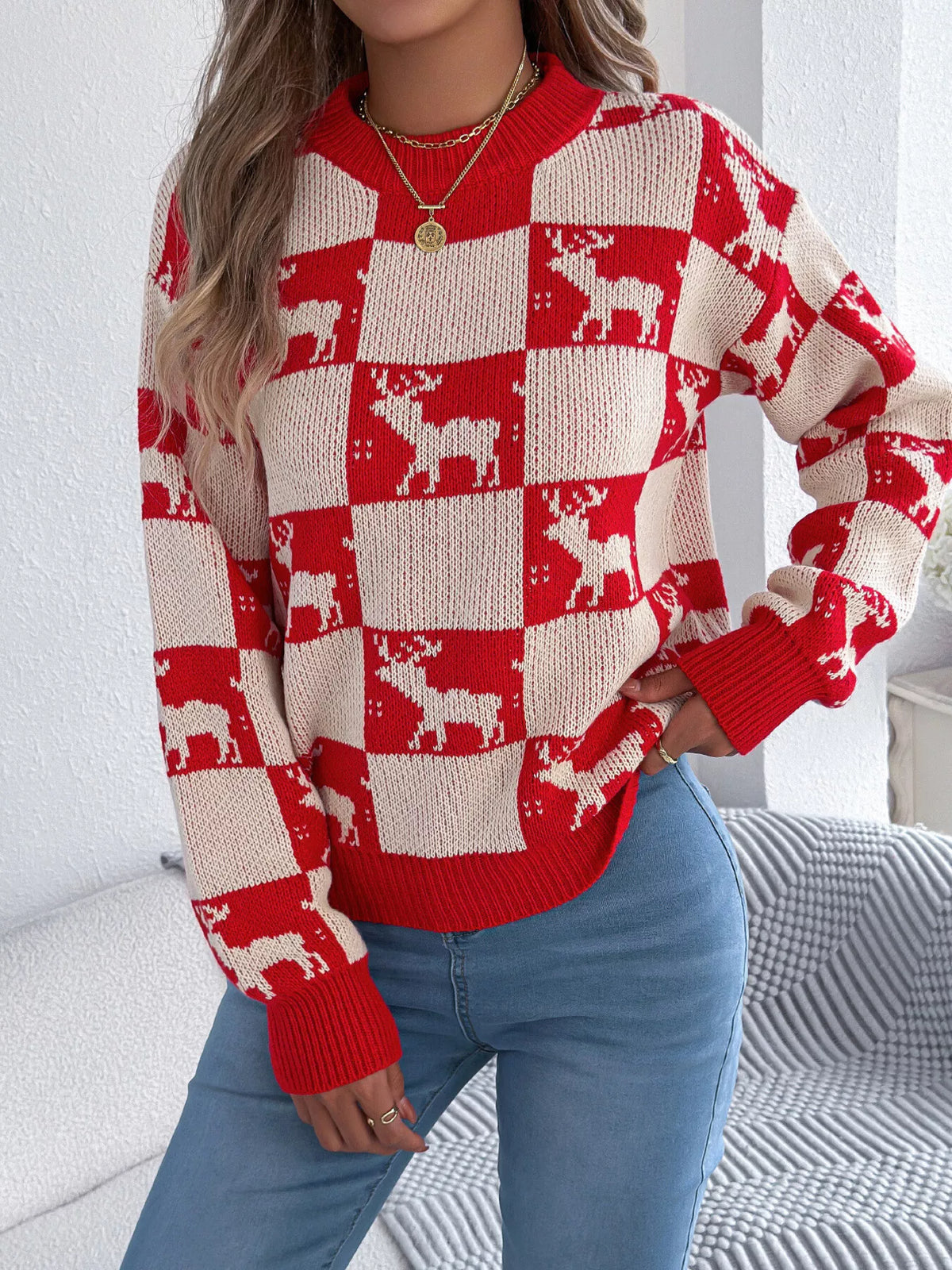 Reindeer Checkerboard Pattern Pullover Sweater in red and cream, front view