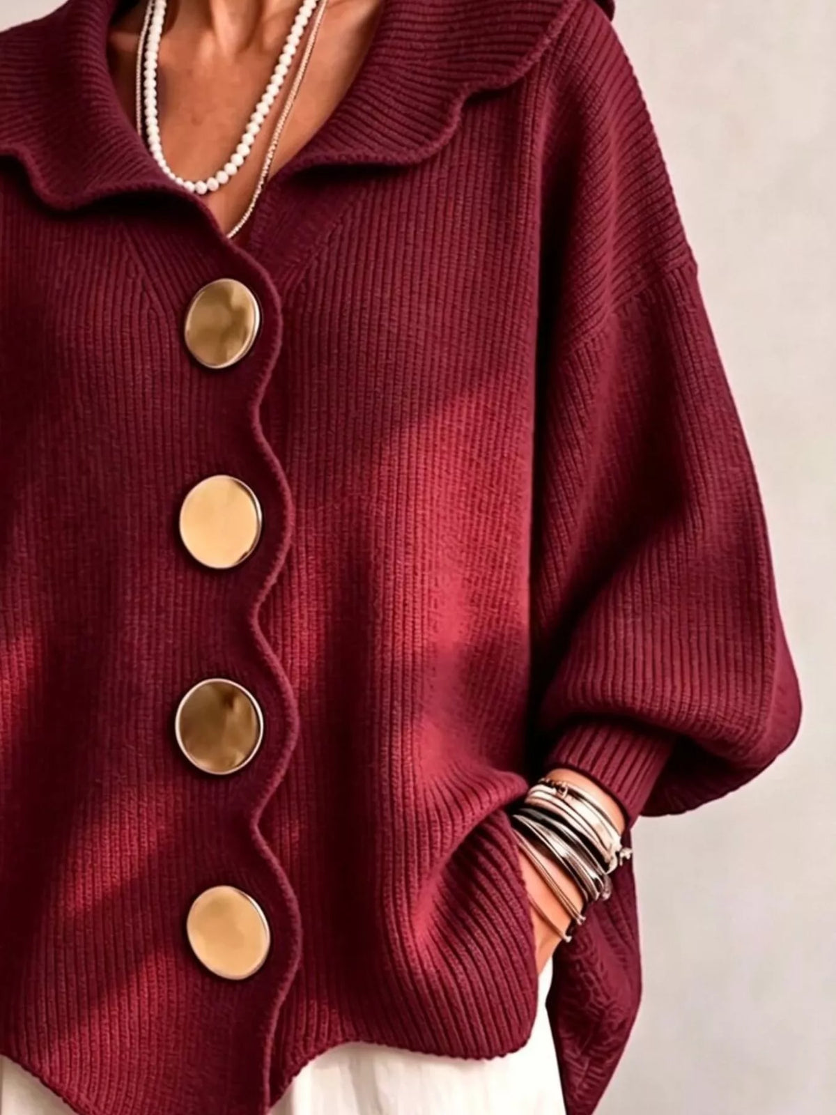 Burgundy scalloped-edge knit cardigan, button and cuff detail