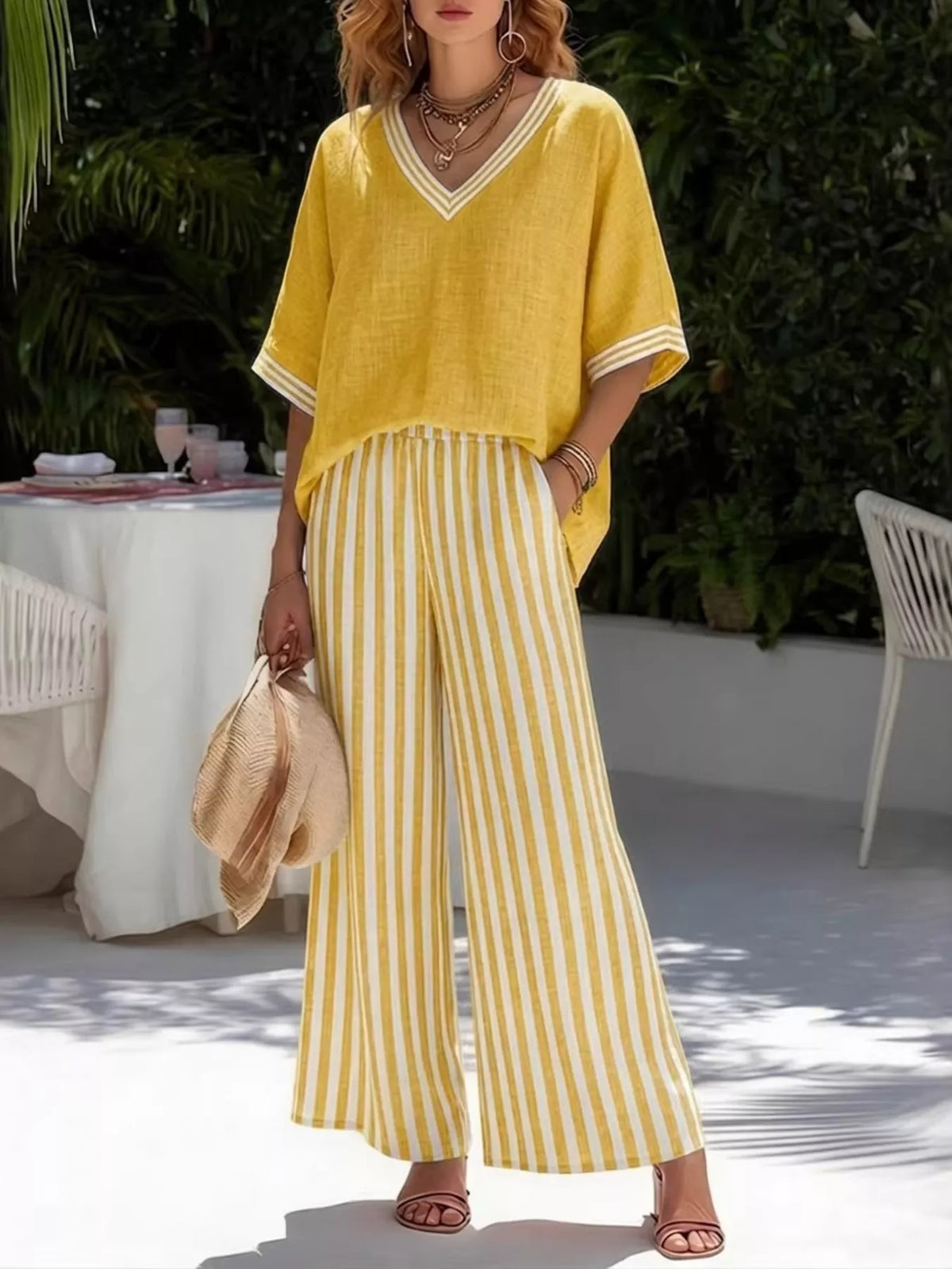 Yellow v-neck striped top and pants two-piece set — front view