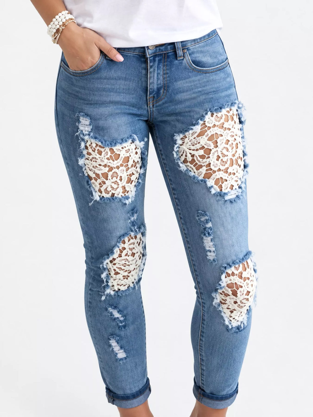 Distressed Lace Skinny Jeans in blue, front view