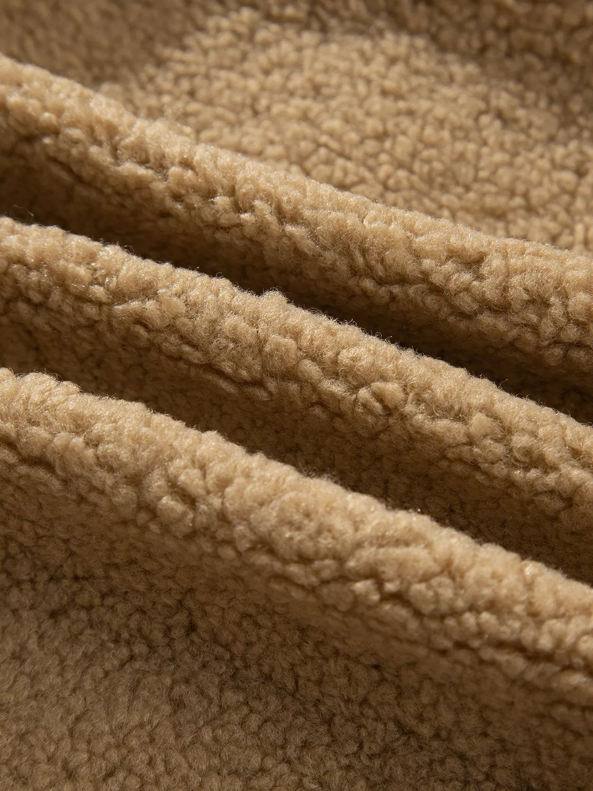 Camel fleece zip-front jacket with contrasting seam trim, fleece texture detail