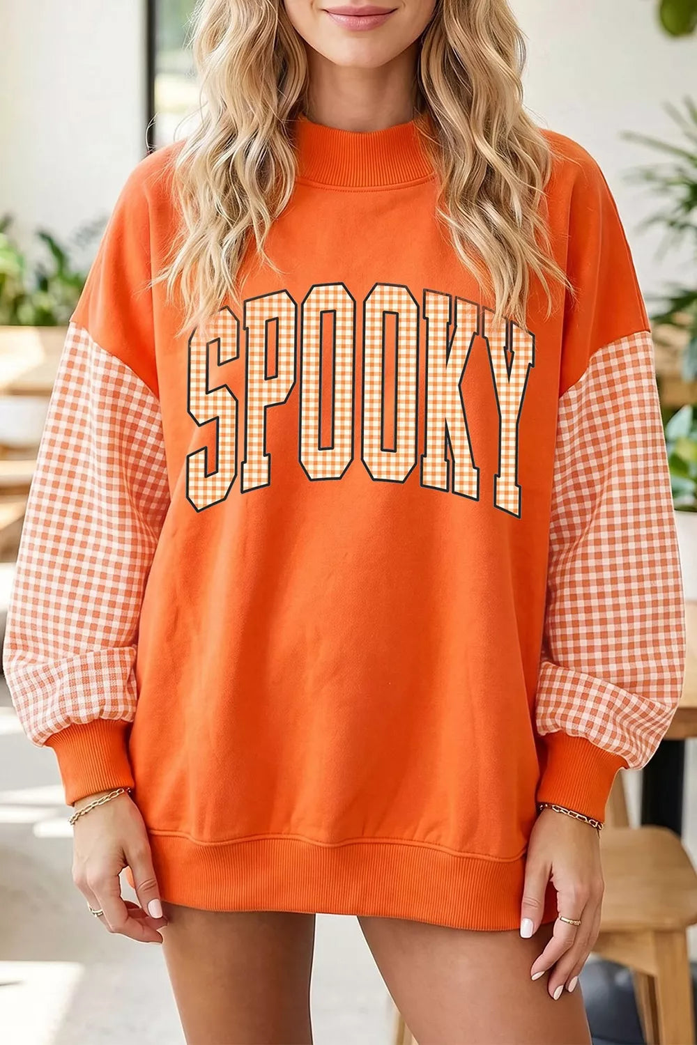 Plaid-sleeve SPOOKY graphic Halloween sweatshirt