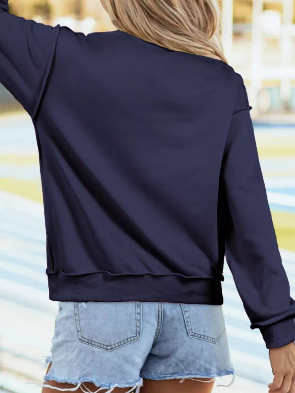 Mock-neck exposed-seam long sleeve sweatshirt