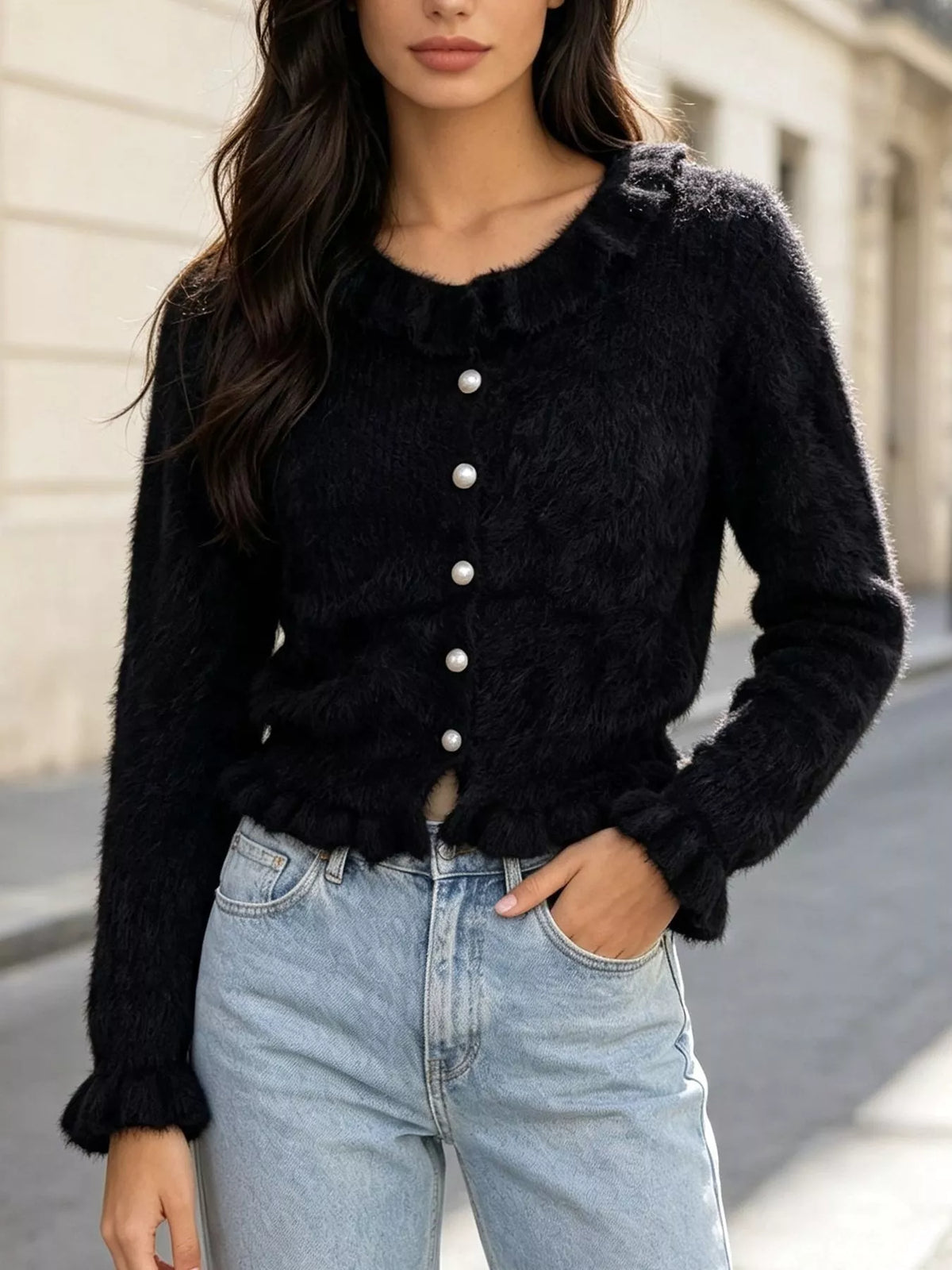 Black fuzzy ruffle-trim button-front cardigan, standing front view.
