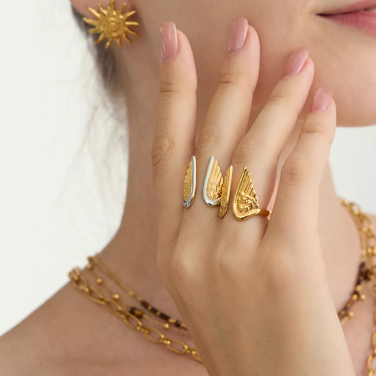 Open Wing Ring, shown worn