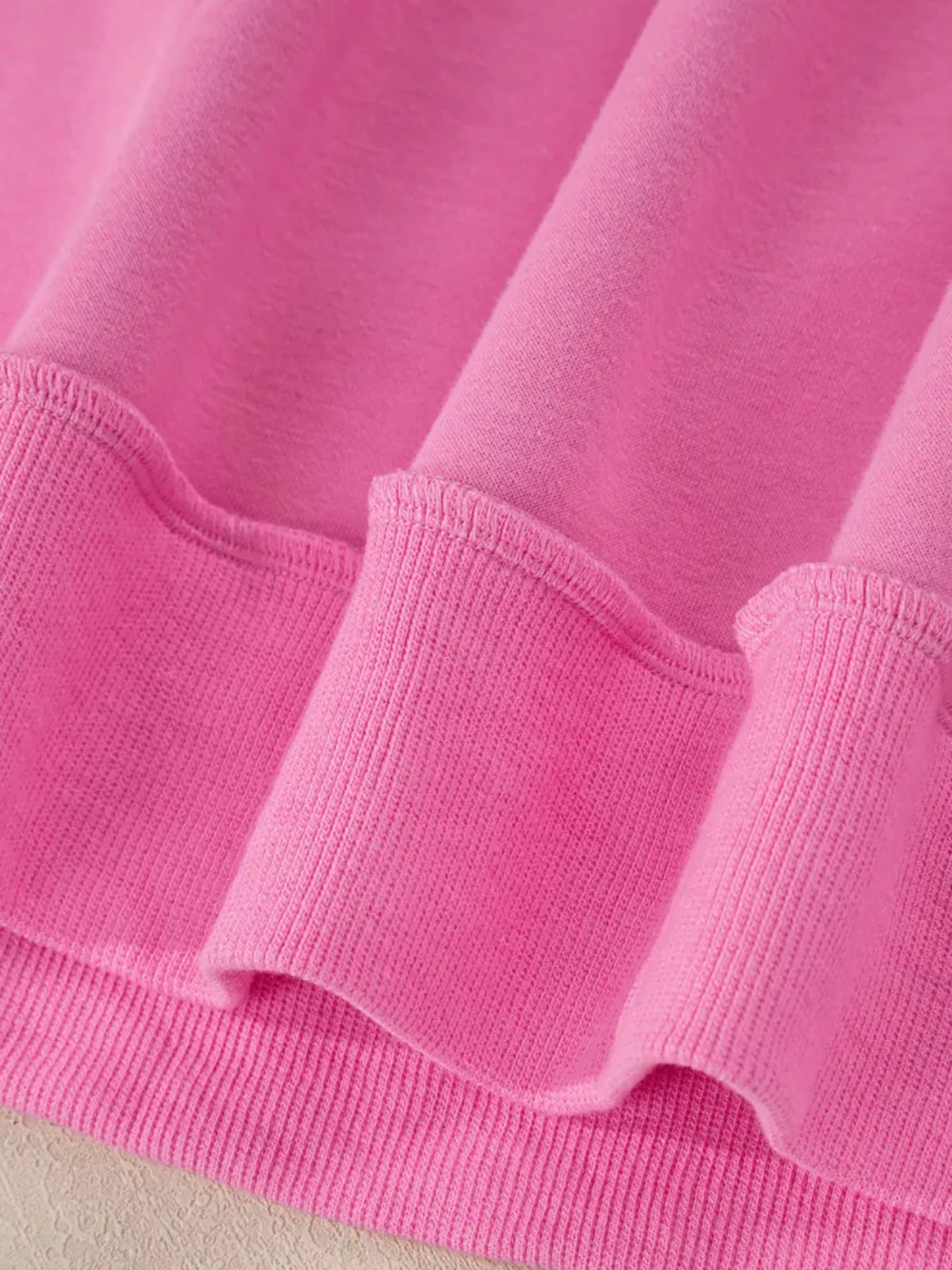 Mock-neck exposed-seam long sleeve sweatshirt
