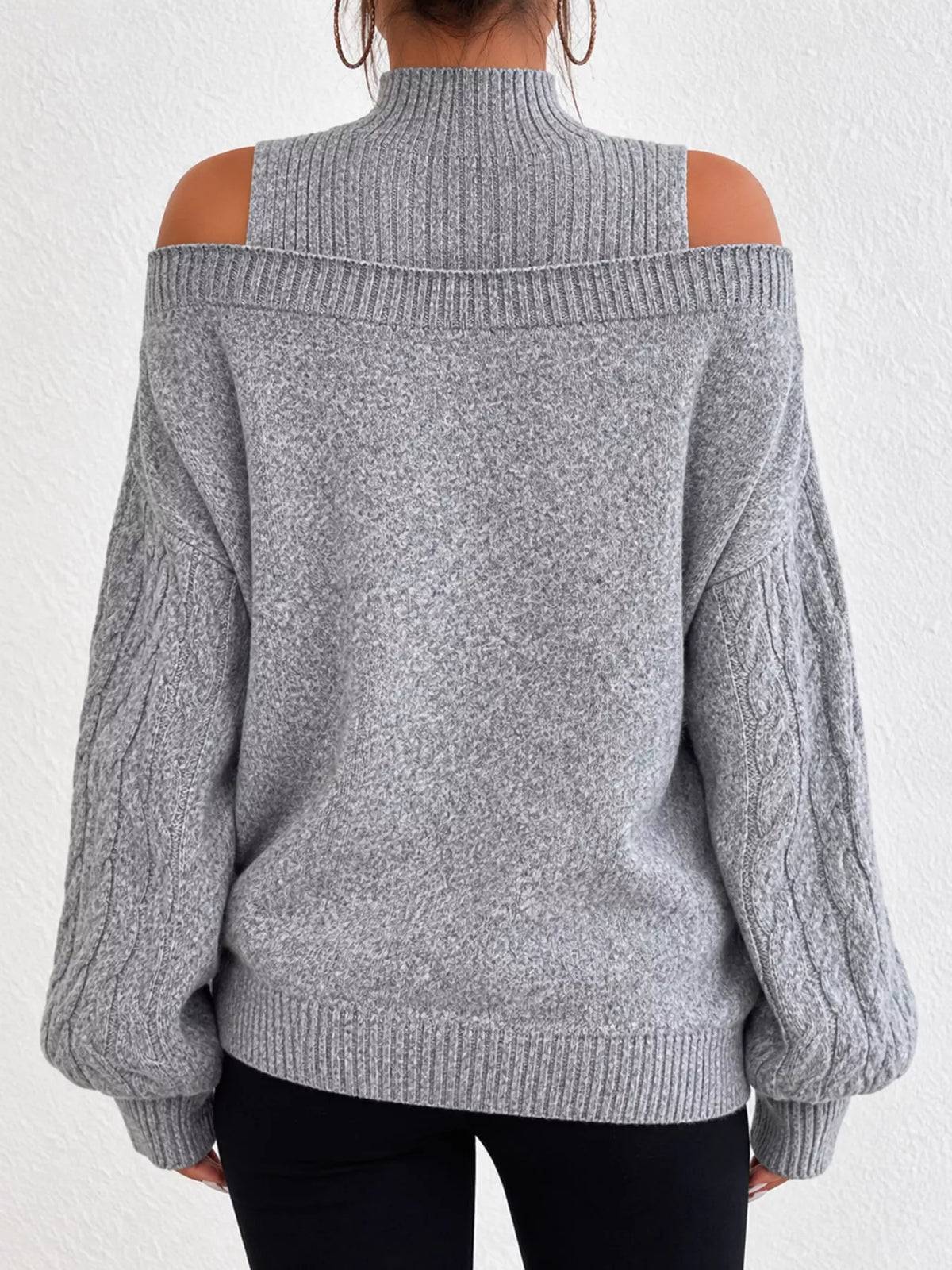 Gray cold shoulder mock neck cable knit sweater, back view
