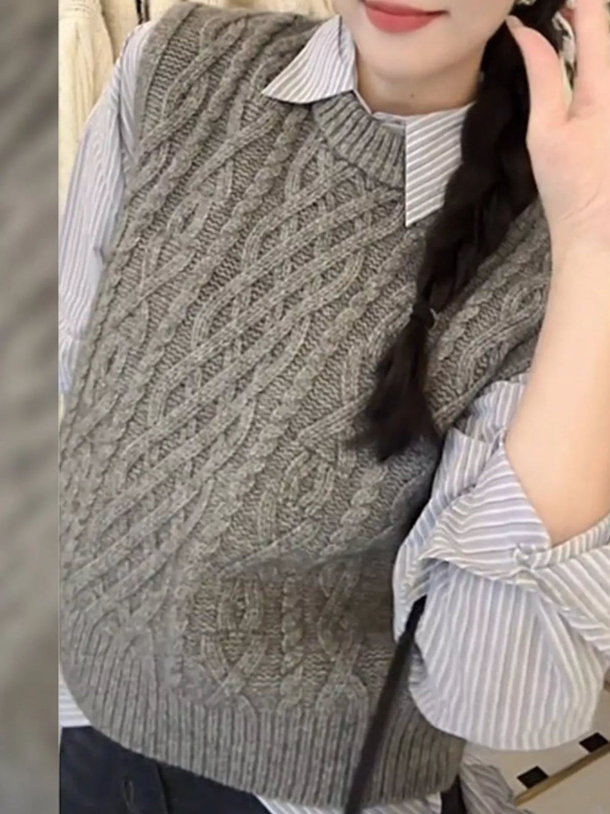 Gray cable-knit sweater vest