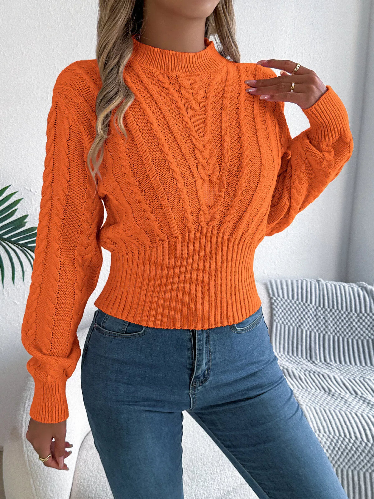 Orange cable knit mock neck sweater