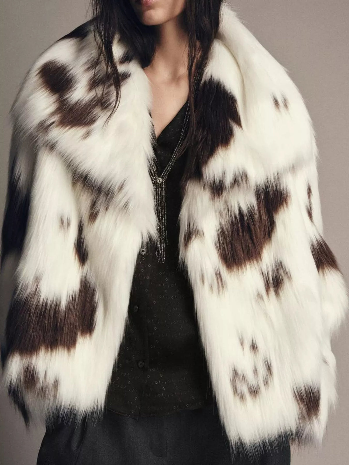 White cow-print faux fur coat