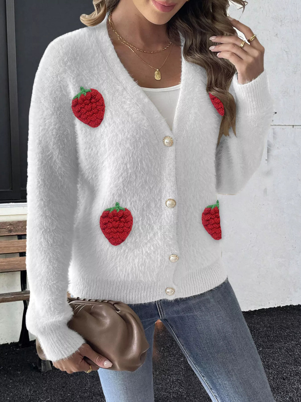 White strawberry-applique cardigan, buttoned front view