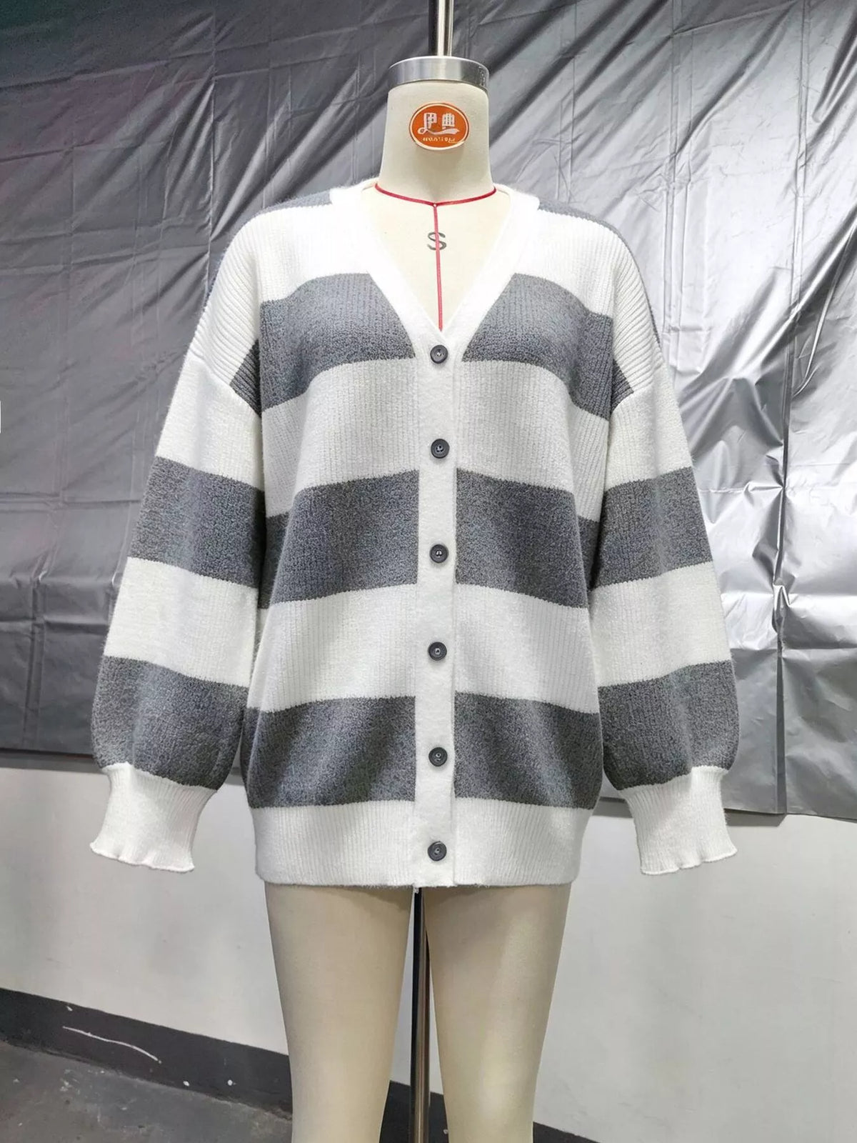 Striped cardigan, gray and white mannequin front