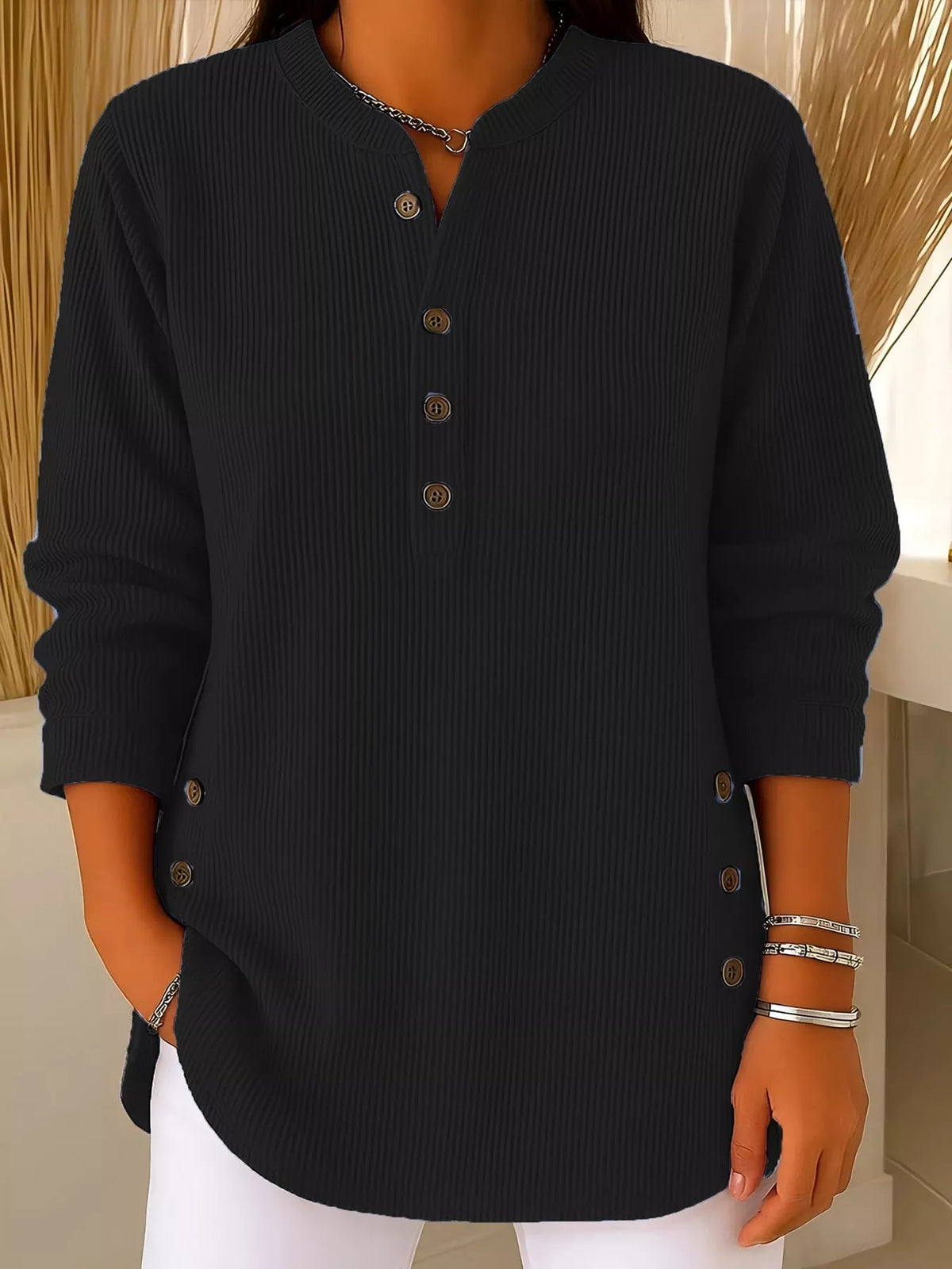 Black button detail long sleeve top, front view