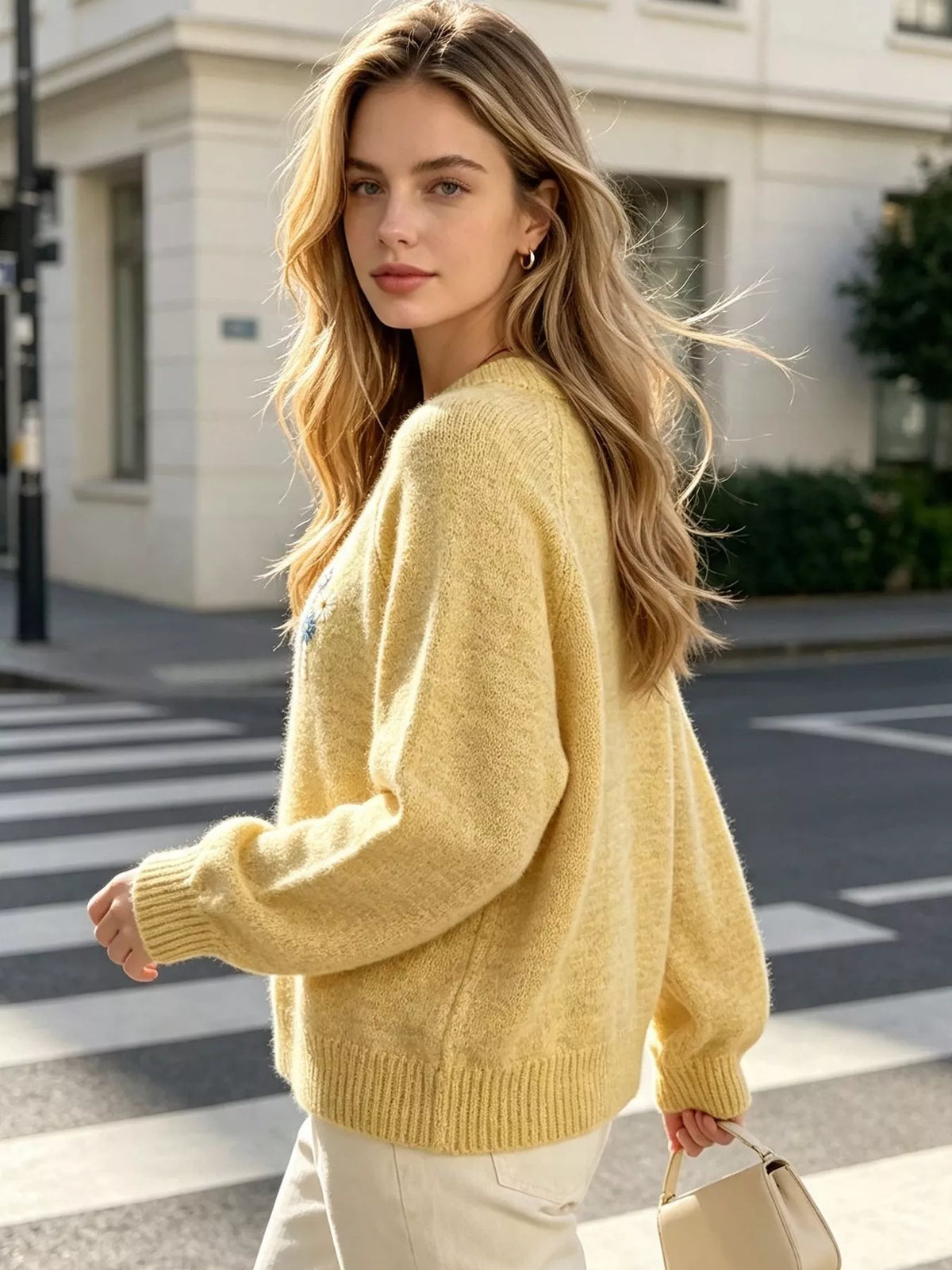 Floral embroidered round-neck sweater in yellow, back view