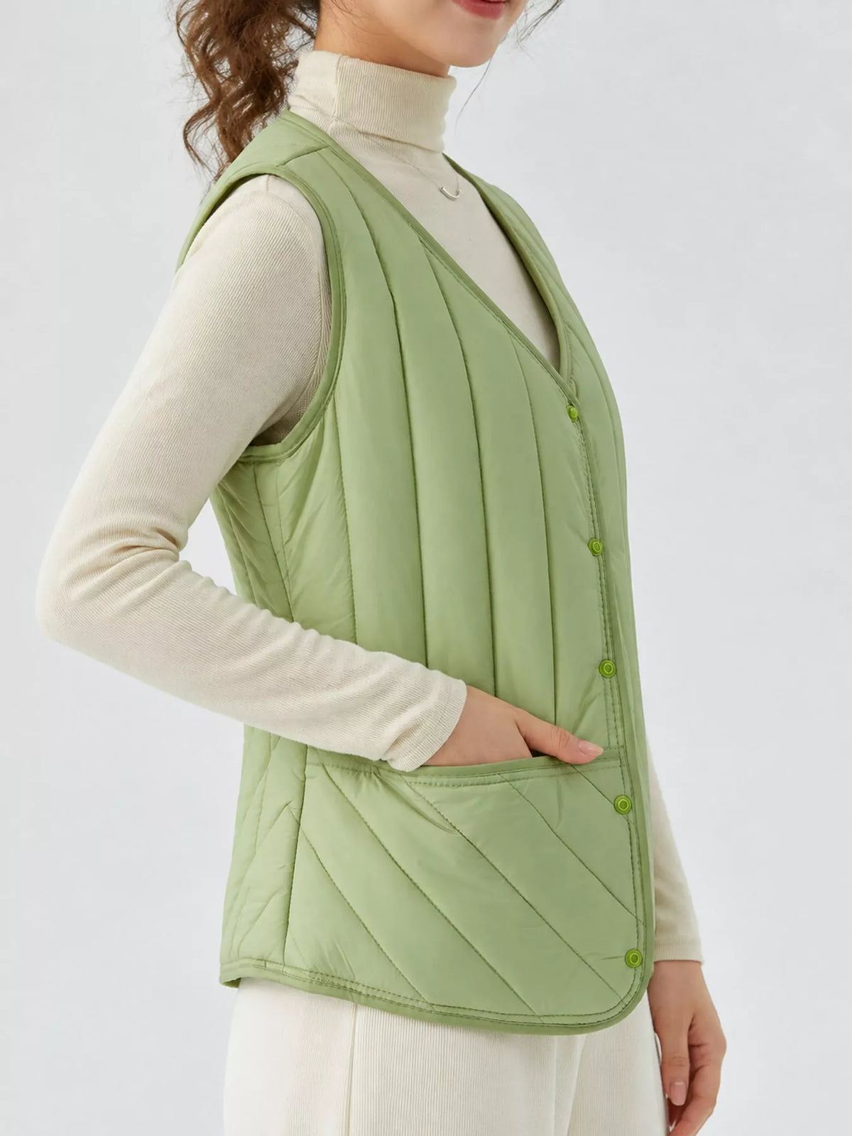 Quilted Button Up Vest in green, side view