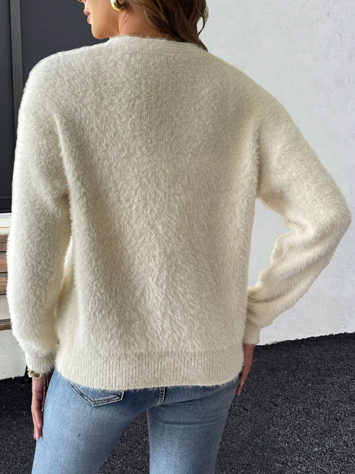 Cream strawberry-applique cardigan, back view