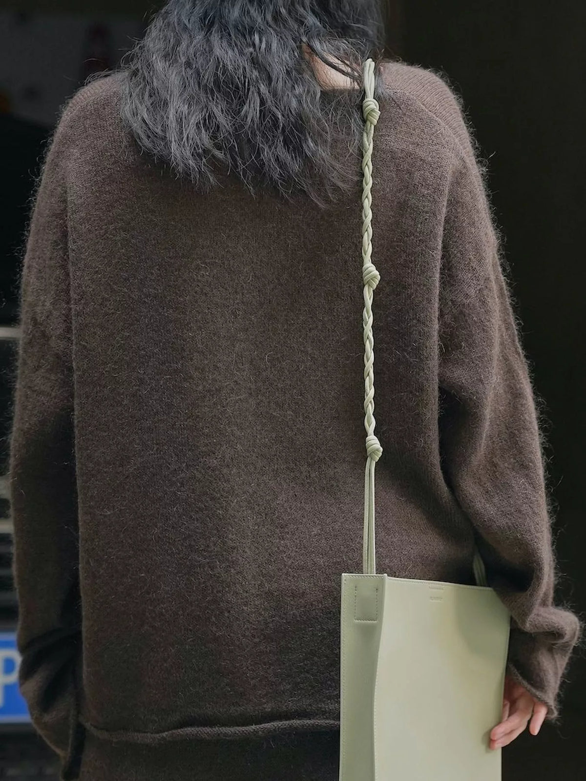 Brown round neck sweater, back view