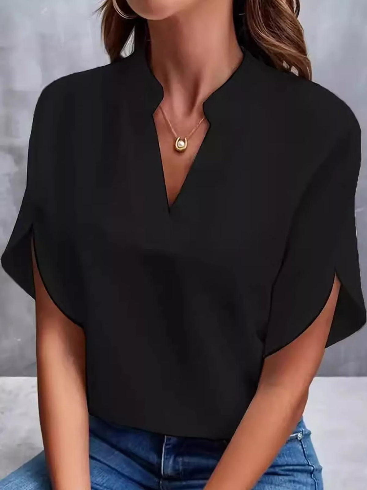 Women's Notched Slit Short Sleeve Blouse in black — front view