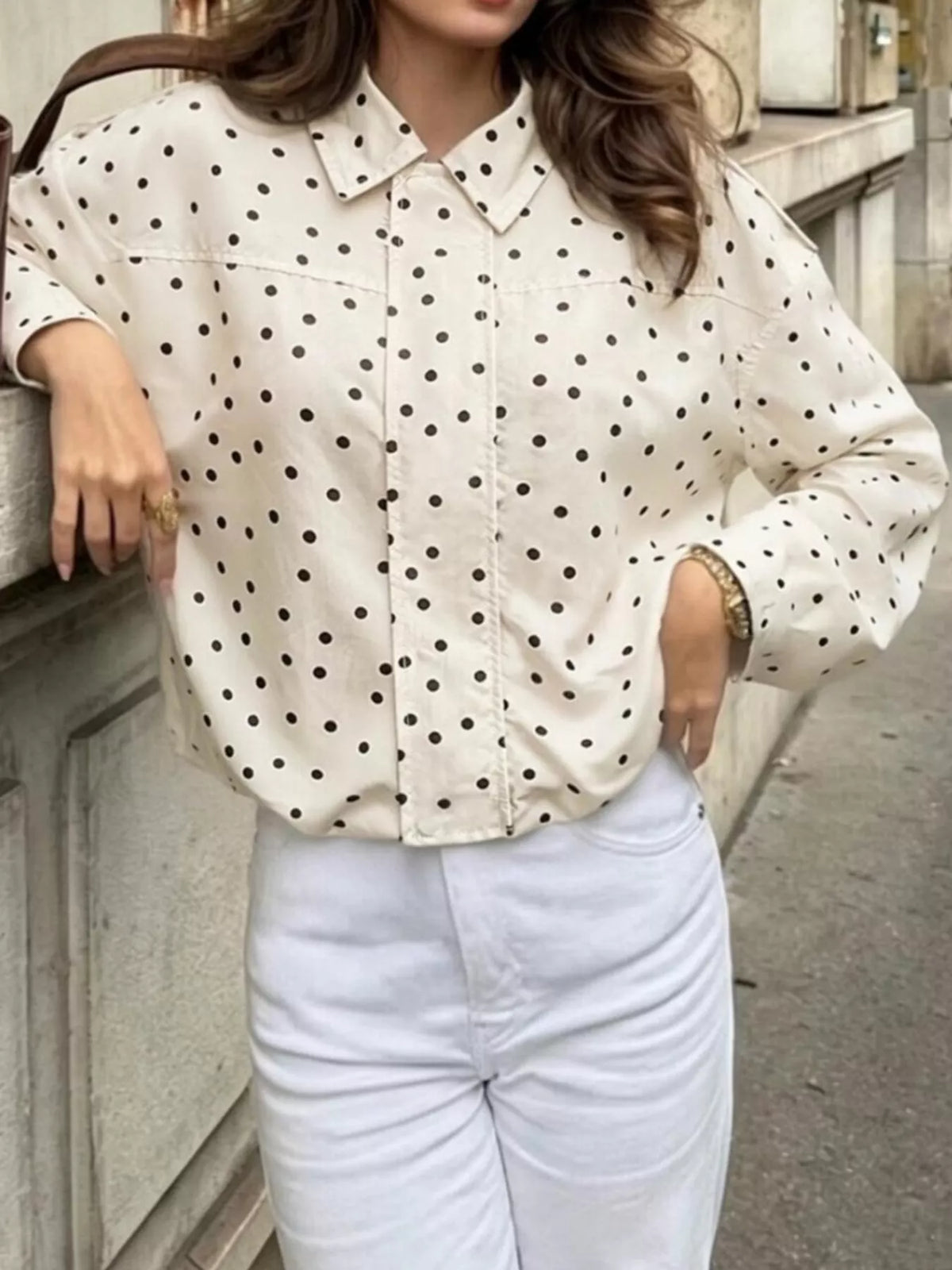 Cream polka dot zip-up jacket — front view