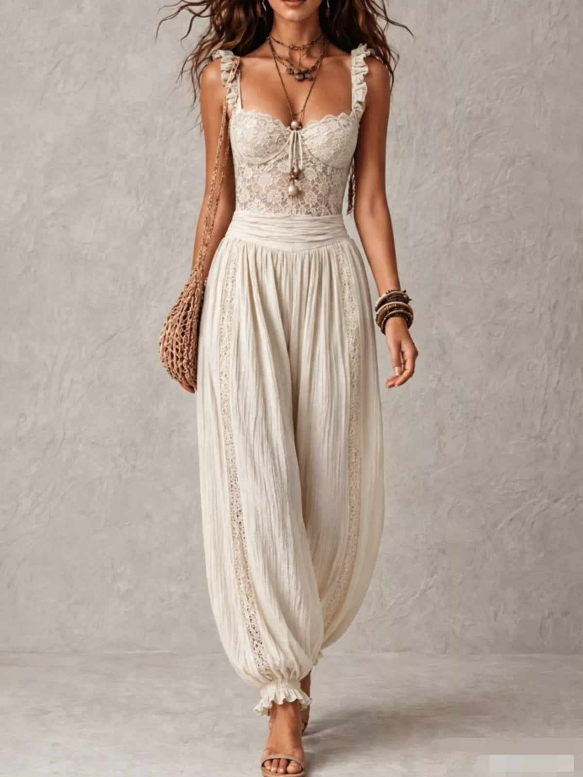 Ivory lace-bodice harem-leg jumpsuit, full front view.