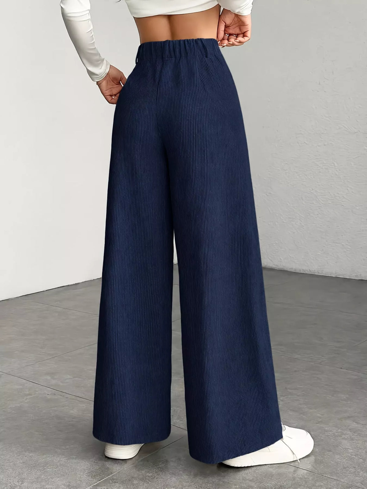 Navy high-waisted wide-leg pants, back view
