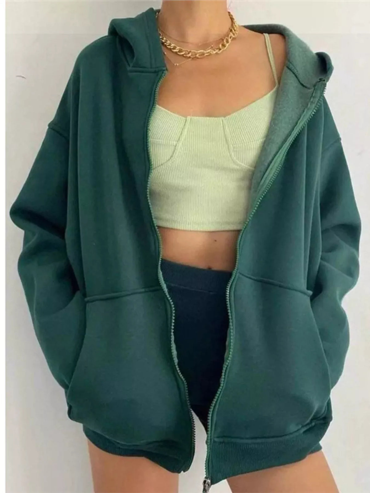Women's Zip-Up Dropped Shoulder Hoodie in green — front view