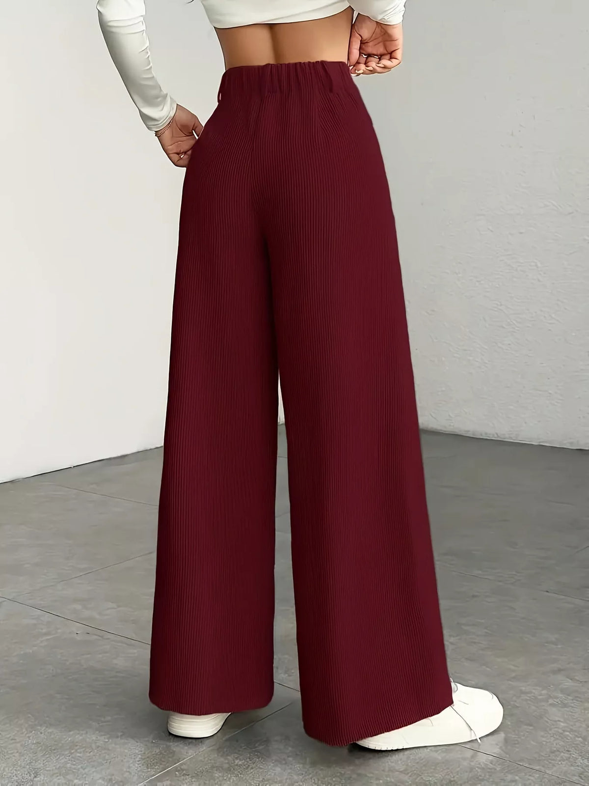 Burgundy high-waisted wide-leg pants, back view