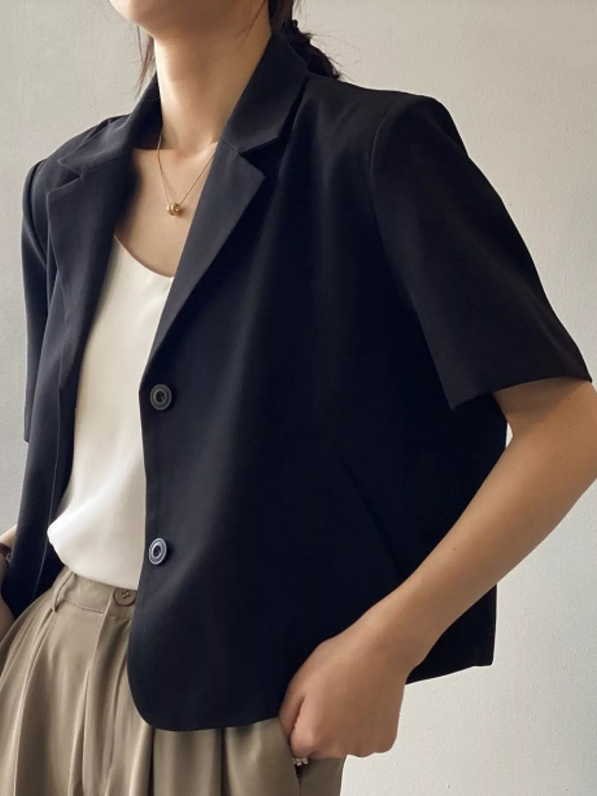 Collared short sleeve blazer, side view
