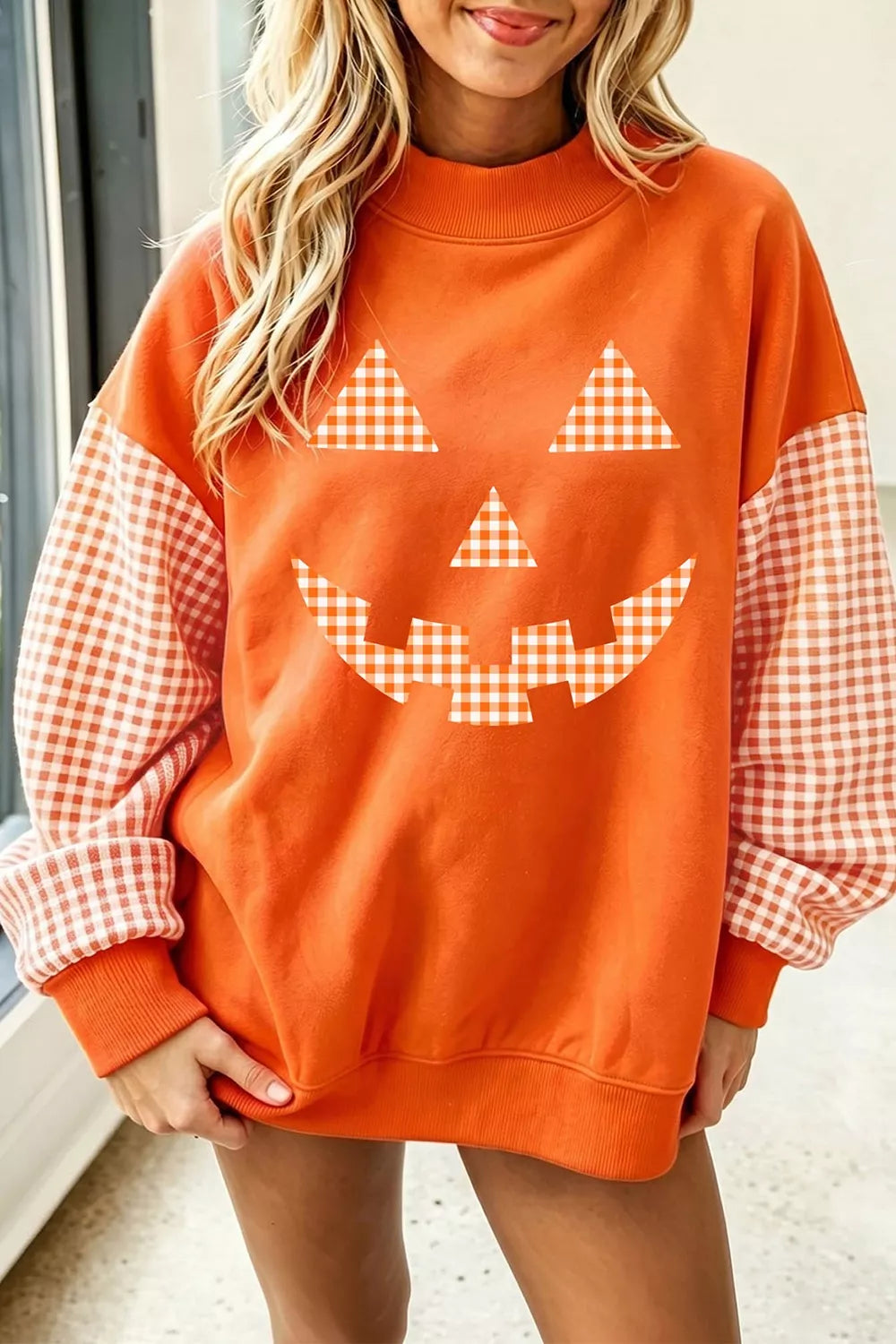Women's plaid-sleeve pumpkin face Halloween sweatshirt