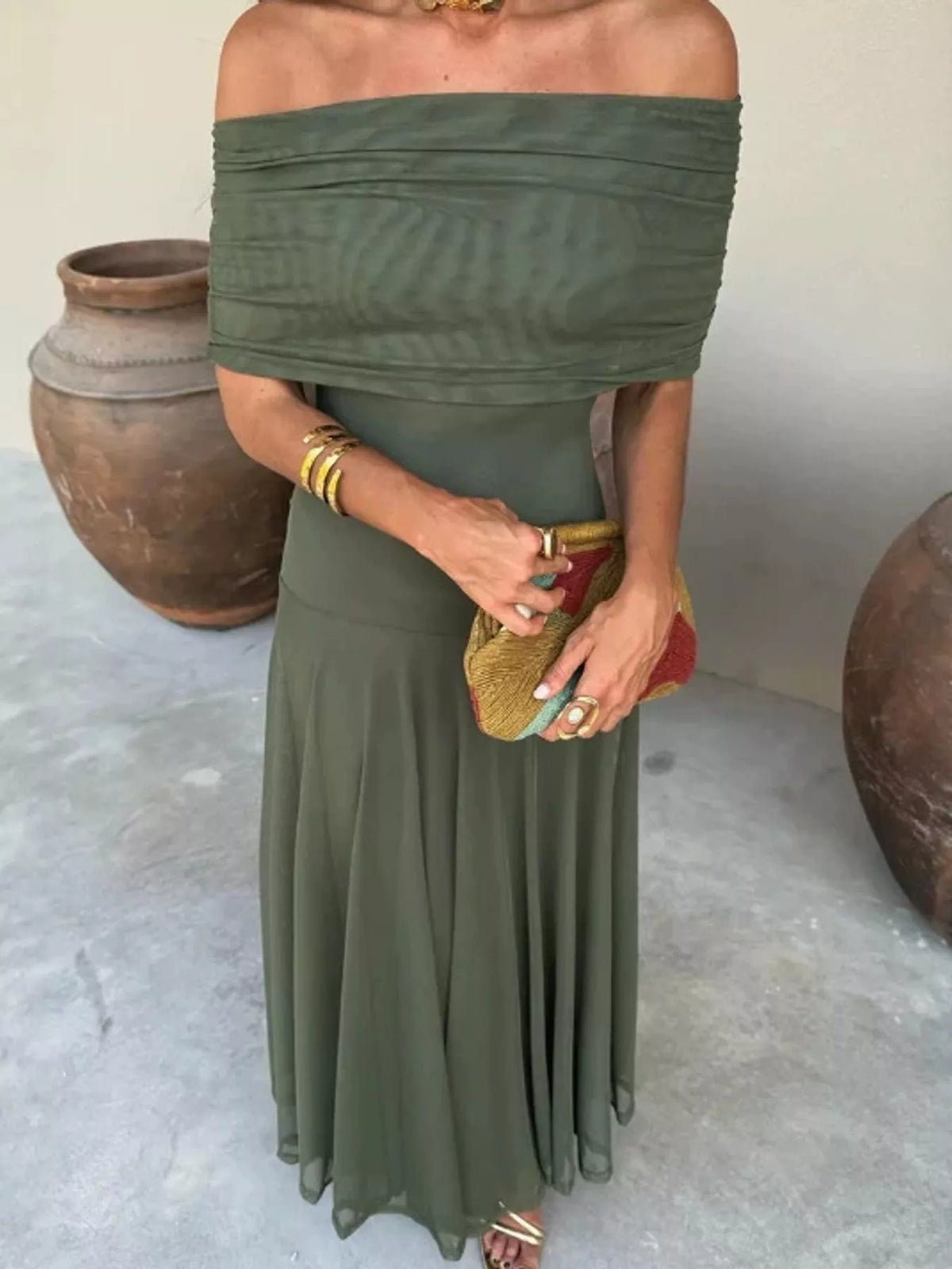 Green off-shoulder ruched maxi dress — design and construction details