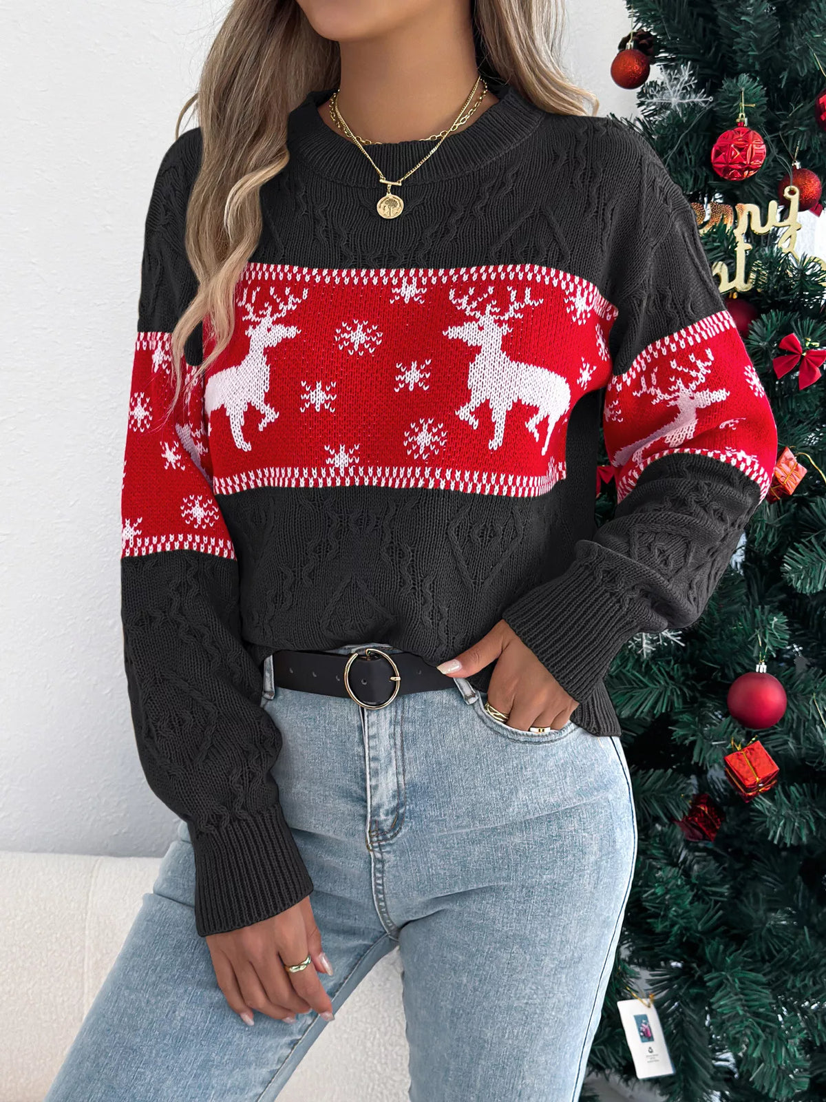 Reindeer Pattern Christmas Sweater in black, front view