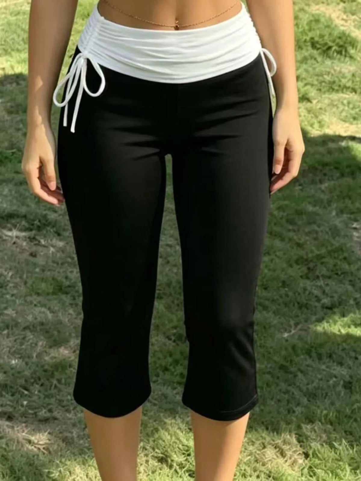 High-Waisted Ruched Drawstring Capri Pants in black and white, front view